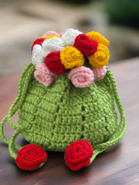 Handmade Crochet Flower Potli Bag – Green Yarn Pouch with Colorful Rosettes