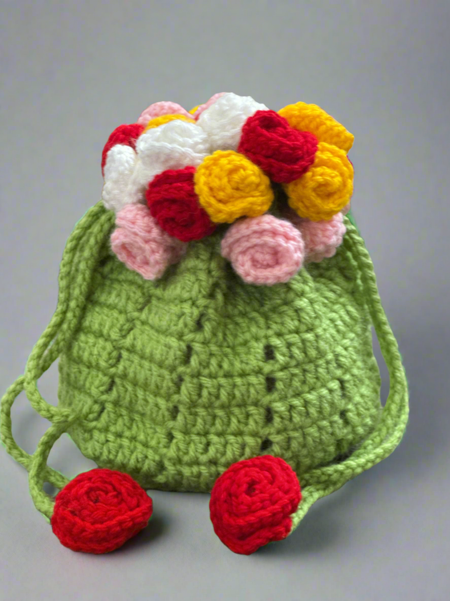 Handmade Crochet Flower Potli Bag – Green Yarn Pouch with Colorful Rosettes